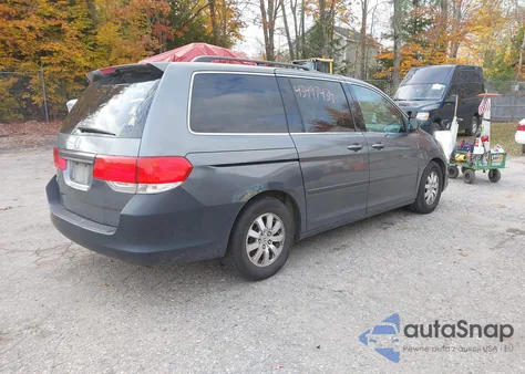 2010 Honda Odyssey Ex-L z USA, uszkodzony, nr VIN 5FNRL3H73AB021493
